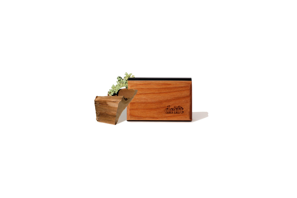 Drift teak wood car air freshener on a car vent