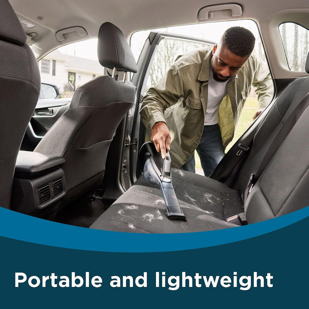 Cleaning a car seat with the portable BLACK+DECKER Dustbuster Reveal