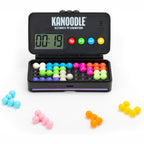 Kanoodle Ultimate Champion case with colorful puzzle pieces and timer