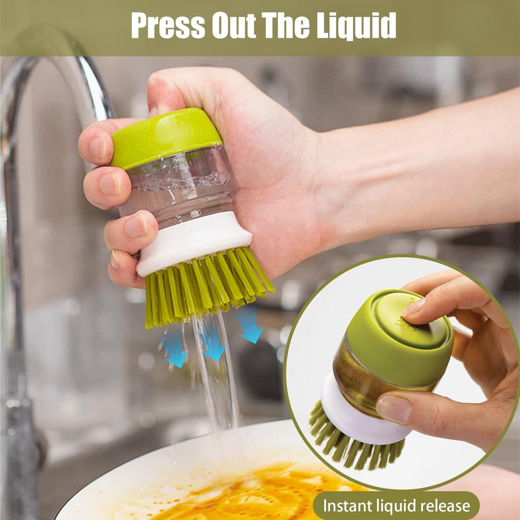 Pressing the top of the dish brush to release soap into the bristles